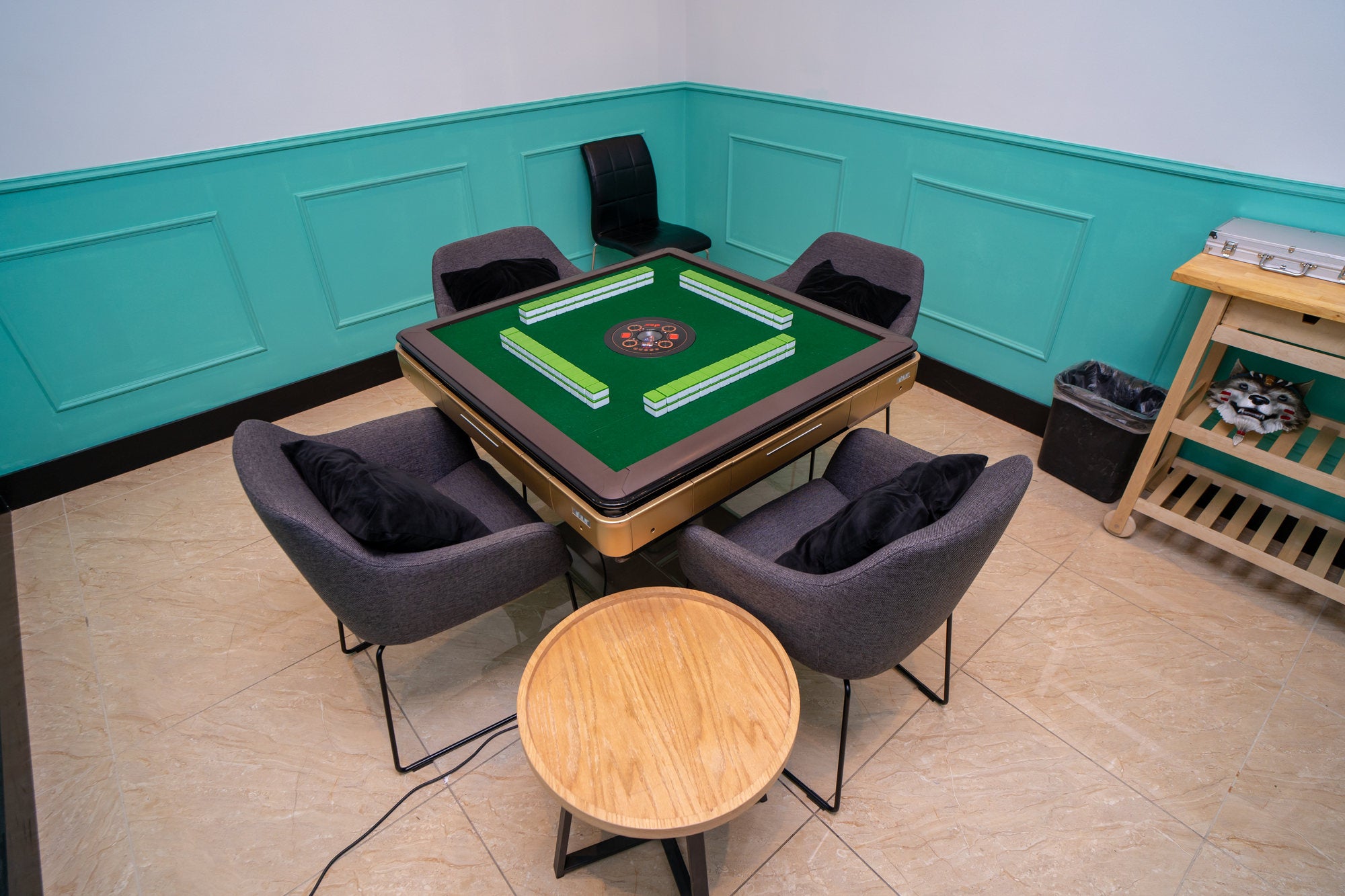 Private Mahjong room with automatic table and lounge chairs